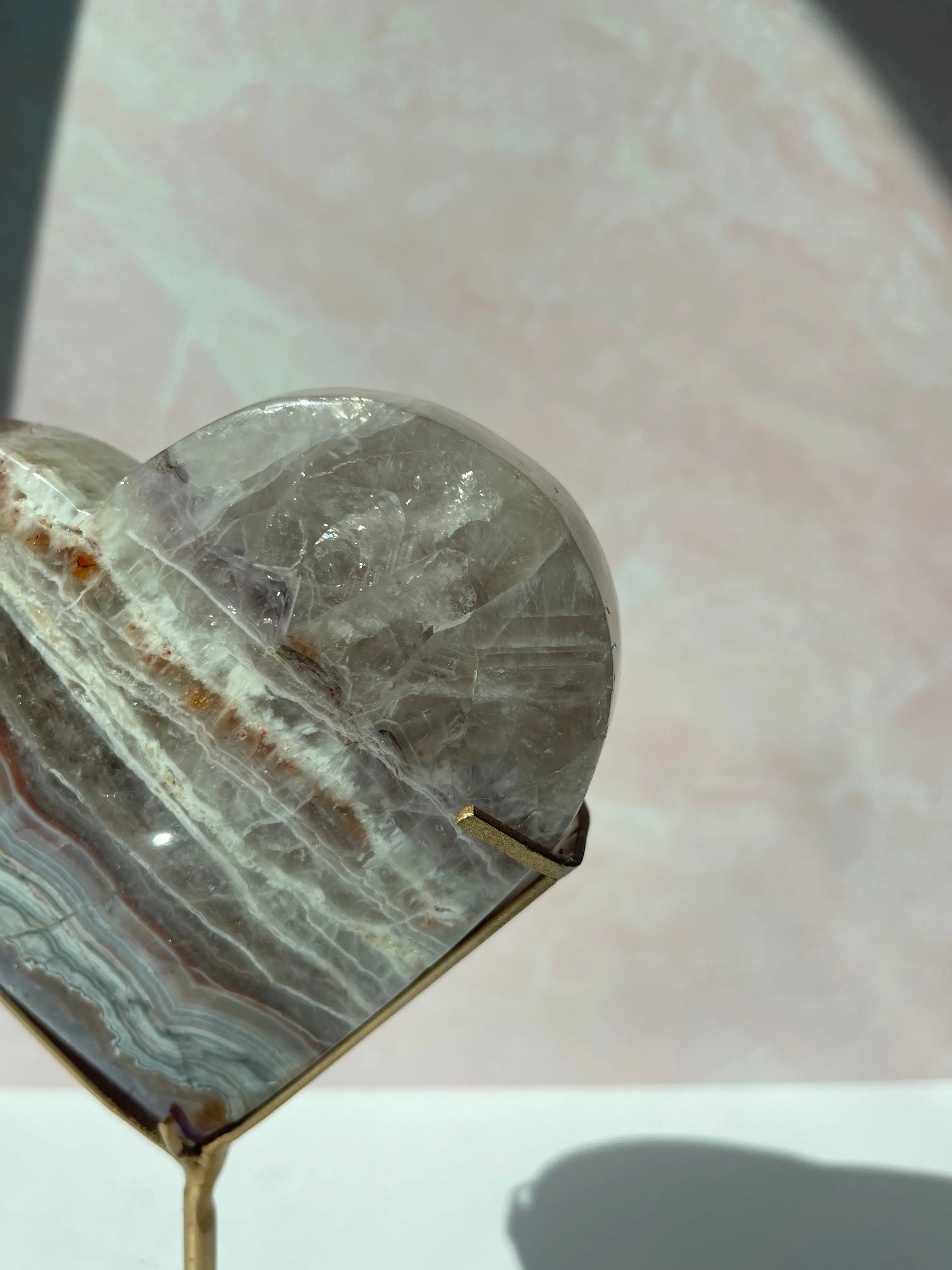 Chevron Amethyst Heart banding close up on gold stand